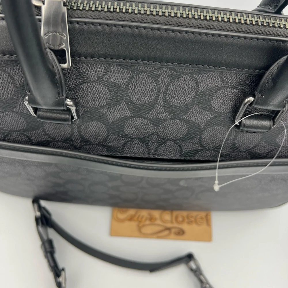 Coach Slim Brief In Signature Canvas With Trolley Sleeve
